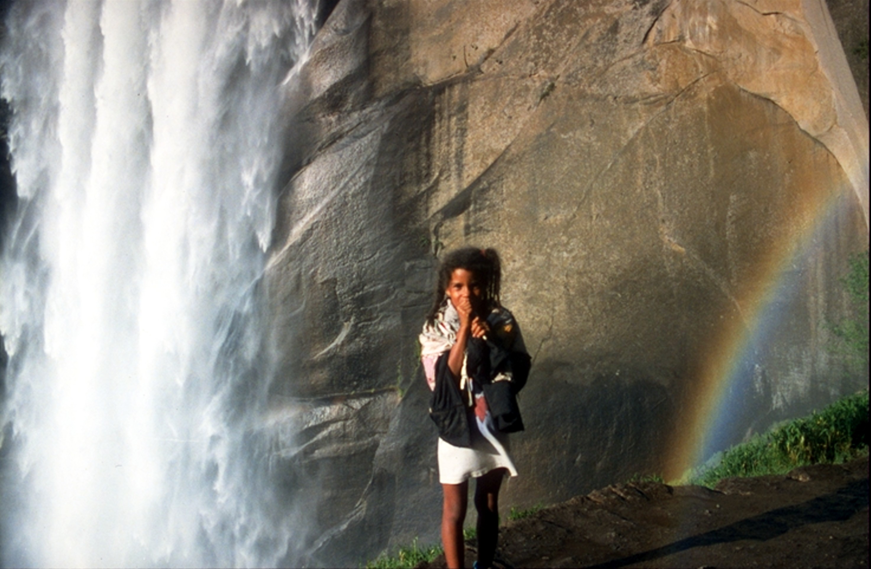 Heather Yosemite waterfall and tiny rainbow