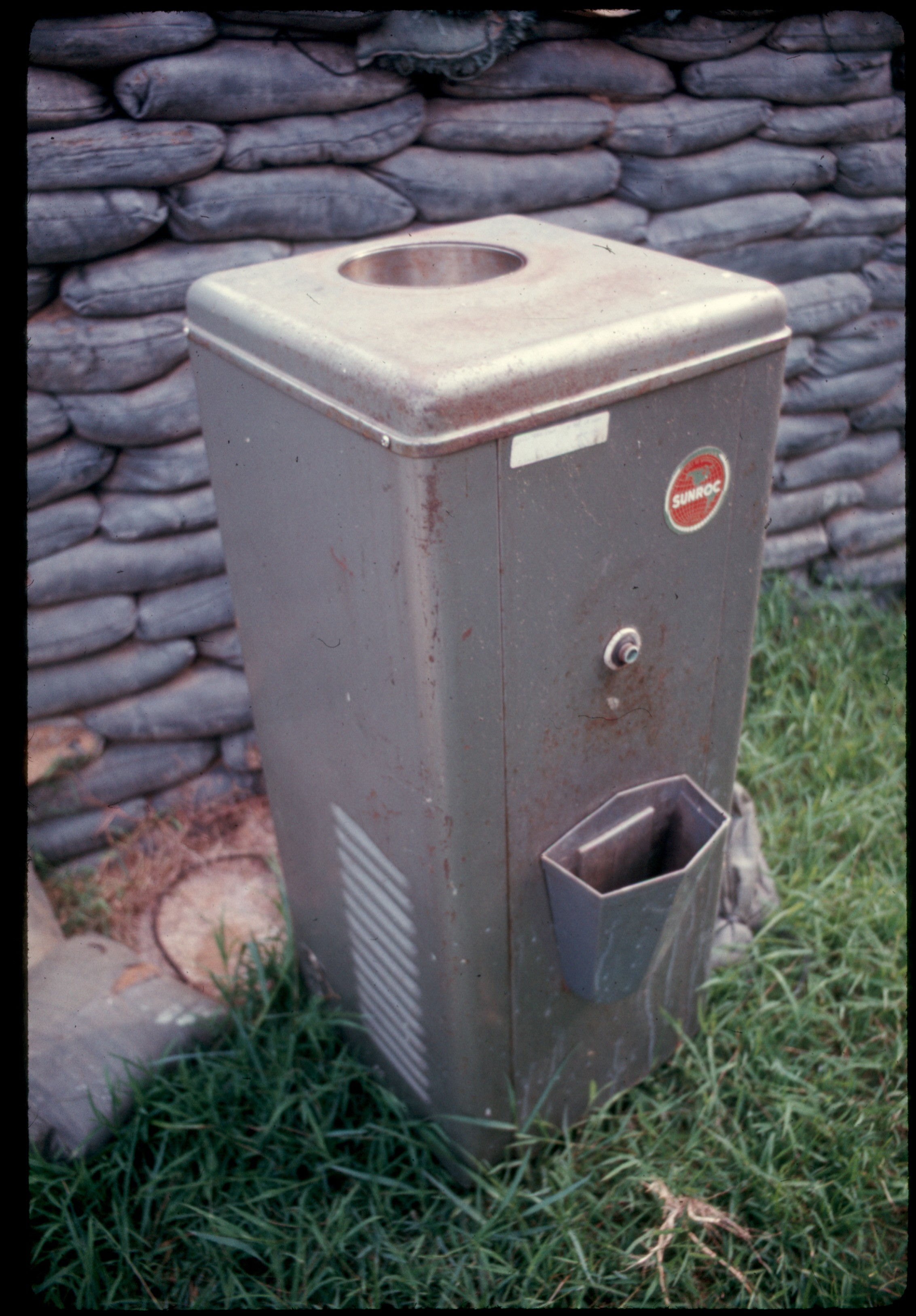ss 025 1970 06 03 water cooler and sand bags outside barracks